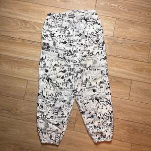 Gymshark Lifting Club Oversized Newspaper Print Woven Pants